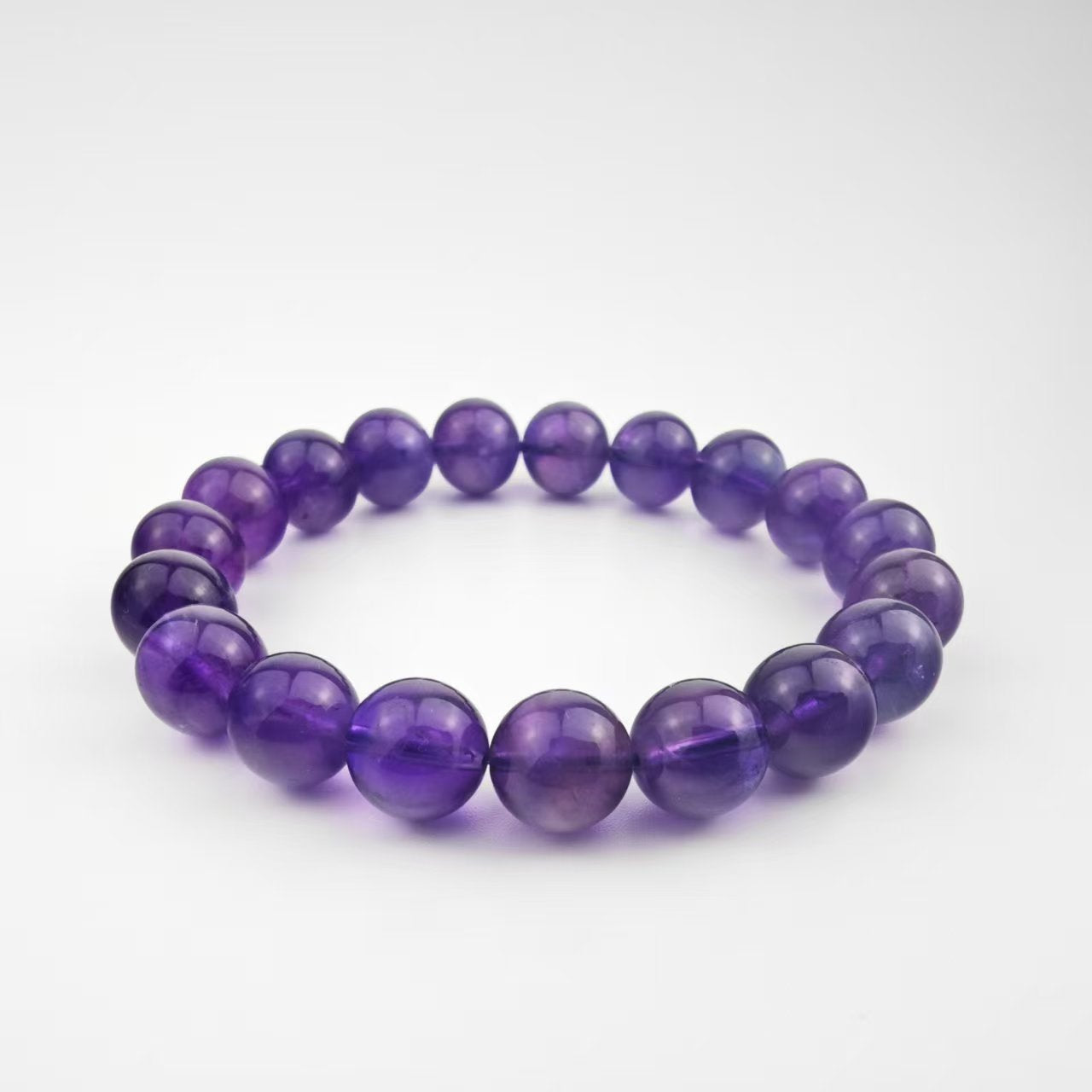Amethyst Beaded Bracelet – Deep Purple Crystal Jewelry for Calm and Meditation
